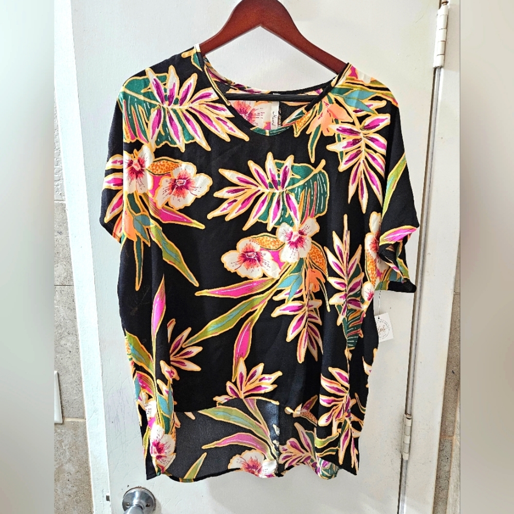 Made in the USA size large black blouse with floral print. Hesed brand.